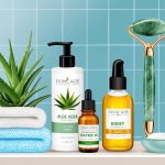 A serene bathroom shelf with natural skincare ingredients like aloe vera, tea tree oil, and honey, alongside a soft towel and a jade roller